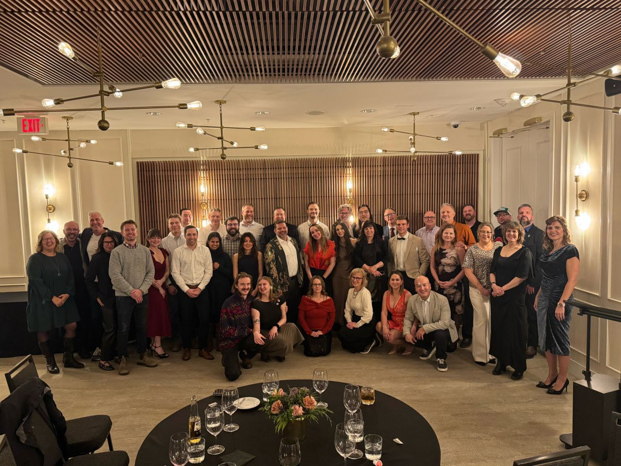 The Intrepid Group team gathered at a company celebration dinner