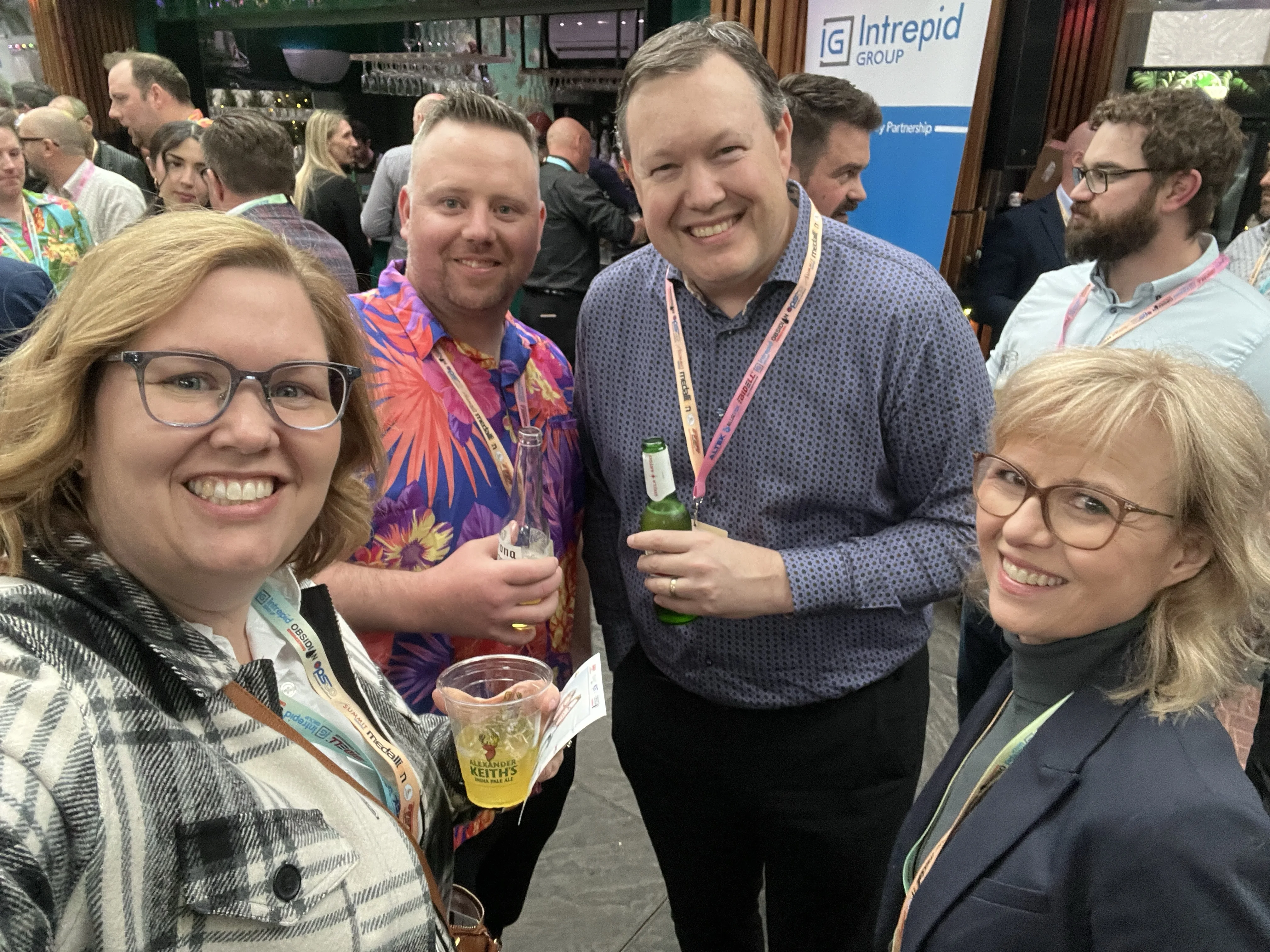 Intrepid team members connecting at an industry networking event